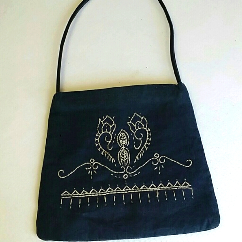One of a kind  Designer denim shoulder bag hand stitched design